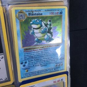 1996 blastoise 1st edition Pokémon card.